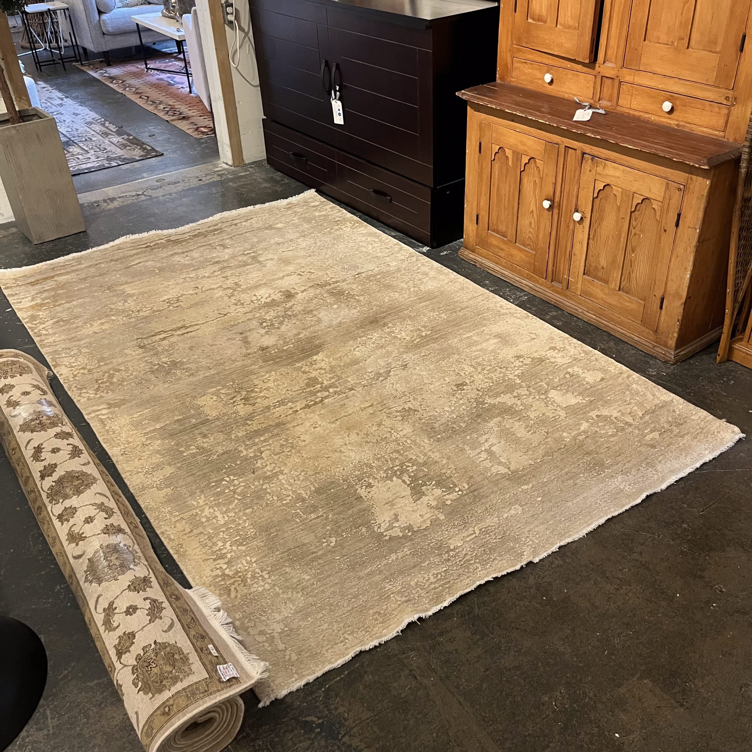 Contemporary Beige Wool Rug - 6'x9' - Coast Consignment